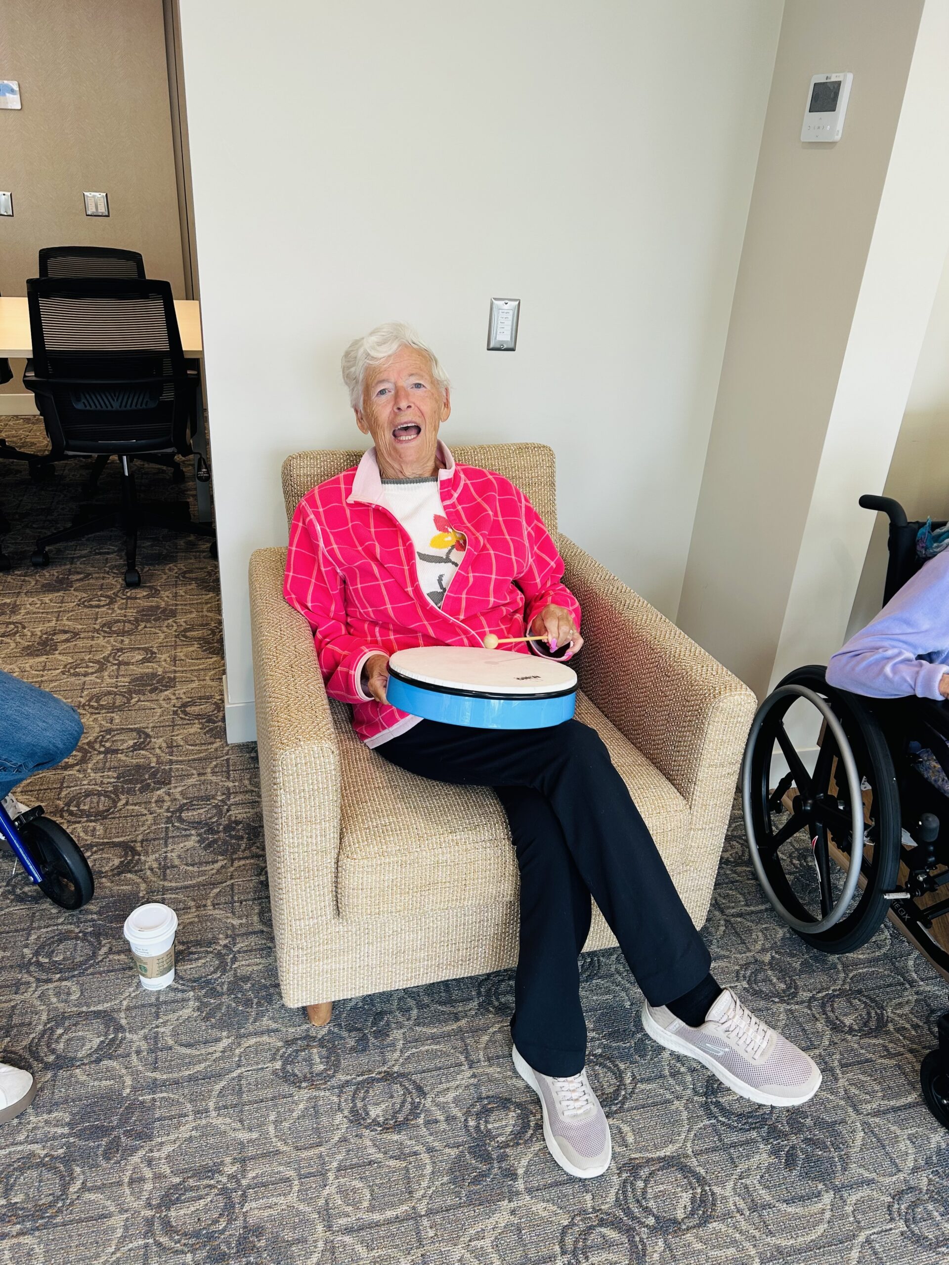 Bayview Seniors Community residents participating in a group drum circle activity in White Rock