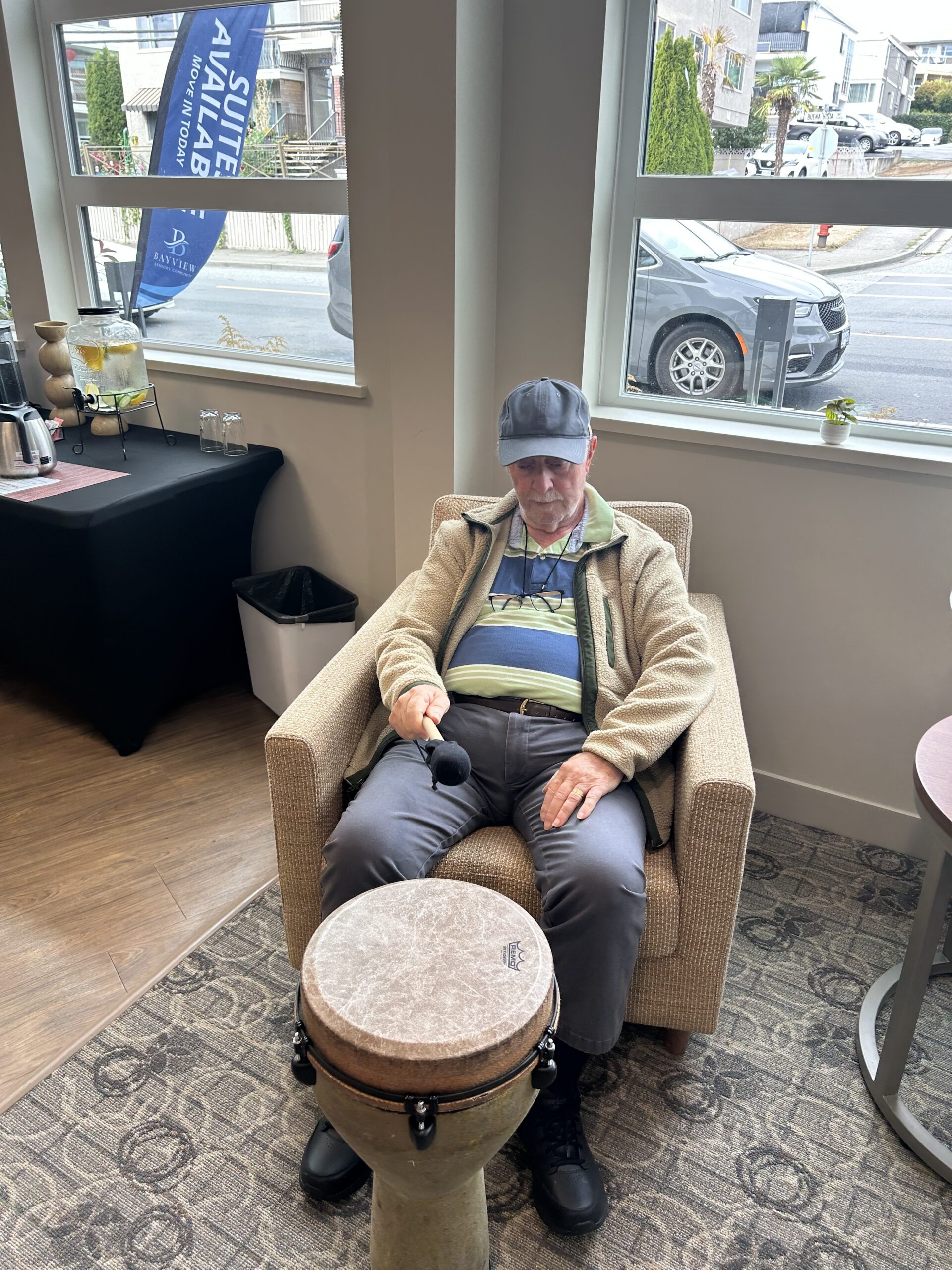 Bayview Seniors Community residents participating in a group drum circle activity in White Rock