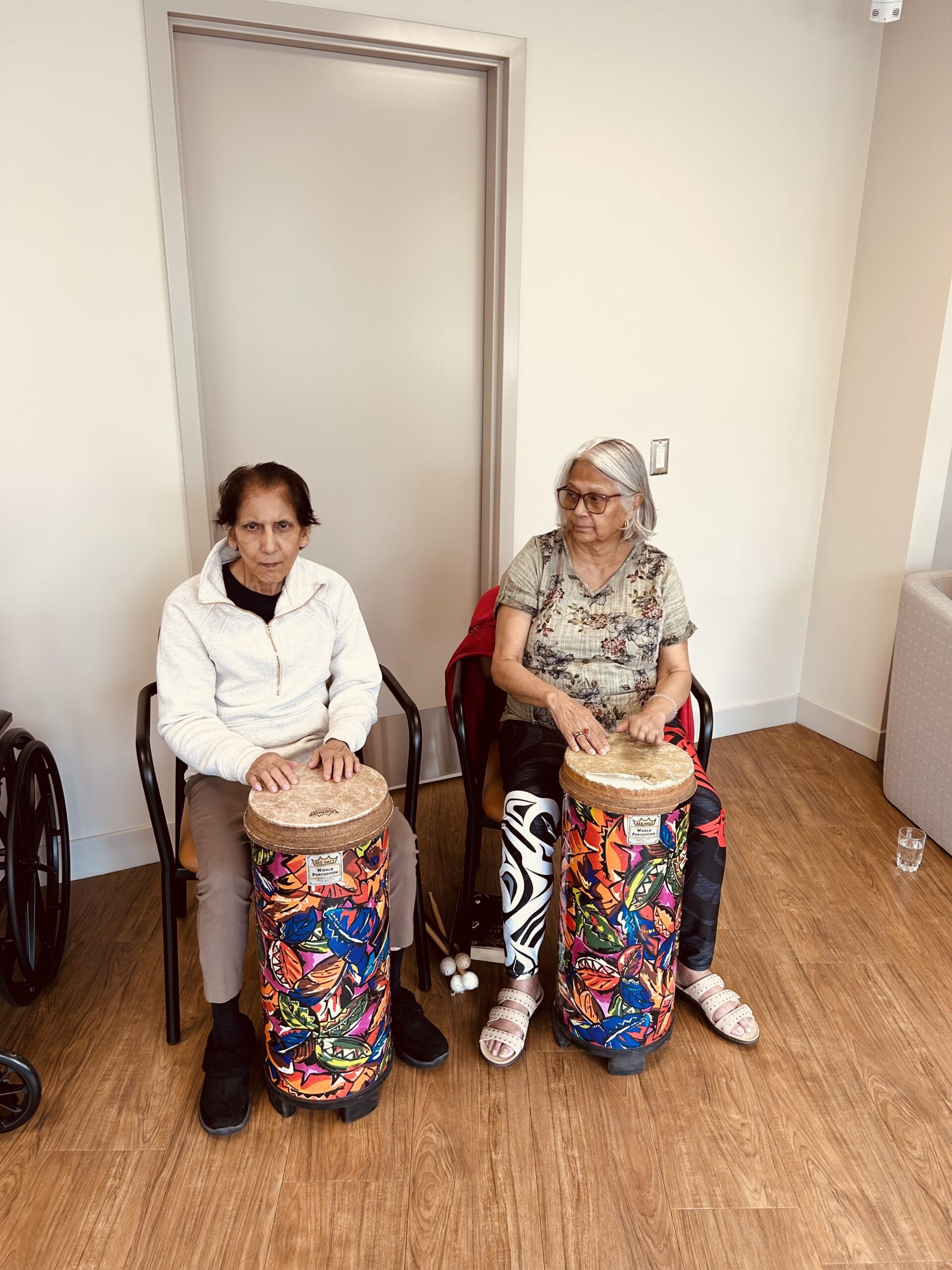 Bayview Seniors Community residents participating in a group drum circle activity in White Rock